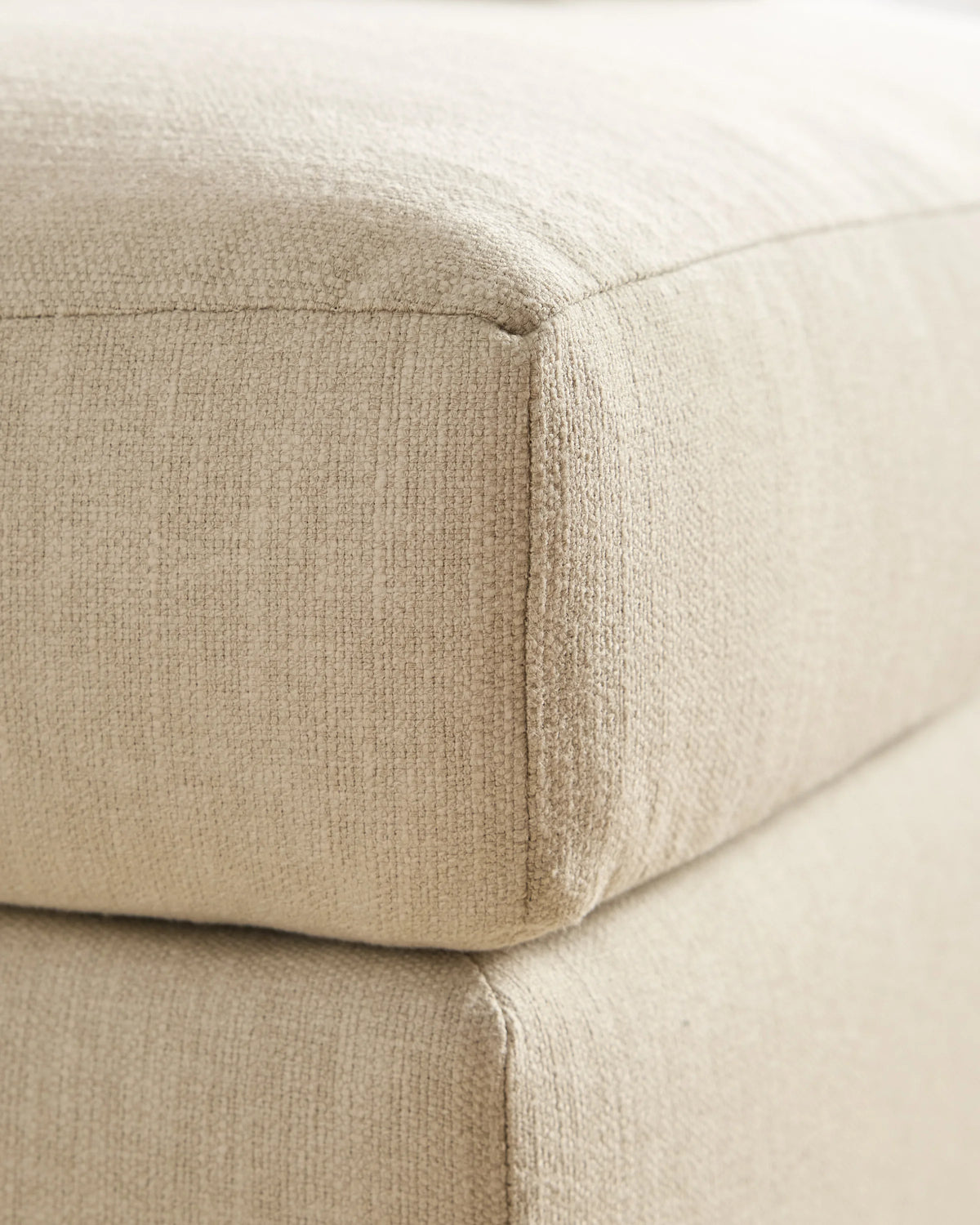 Brennan Ottoman in Performance Basketweave - One Size / Flax
